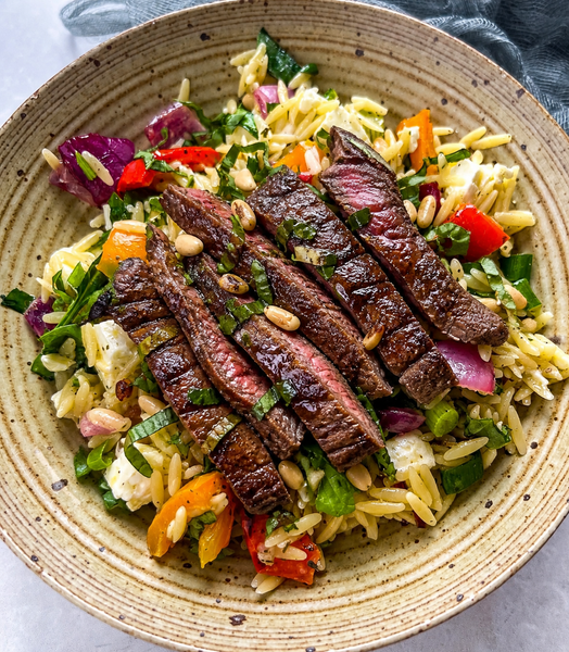 Marinated Steak with Roasted Vegetable Lemon Orzo